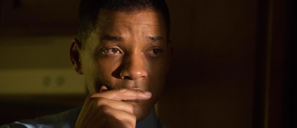 This image released by Columbia Pictures shows Will Smith in a scene from the film, "Concussion." Smith plays Dr. Bennet Omalu, a Nigerian-born forensic pathologist in Pittsburgh who knows nothing about football when he performs the autopsy on former Steelers center Mike Webster. Omalu discovers CTE in Webster's brain, setting him on a journey that exposes the concussion crisis. (Melinda Sue Gordon/Columbia Pictures via AP)