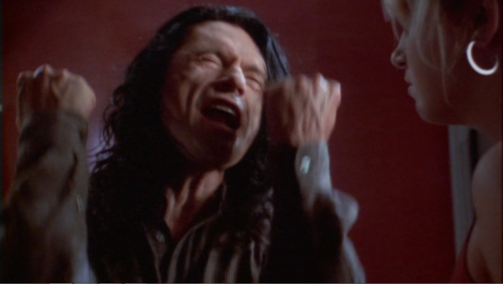 a scene from Wiseau's film The Room