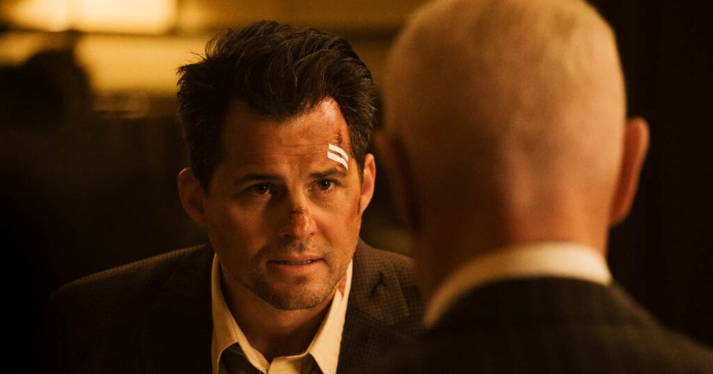 A man stares at each other in a still from The Shift