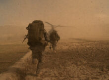 A soldier runs in a still from Interpreters Wanted