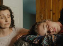 a woman lies on a bed while the other sits on the floor in the film good side of bad