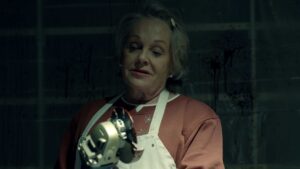 a lady uses a saw In final recovery