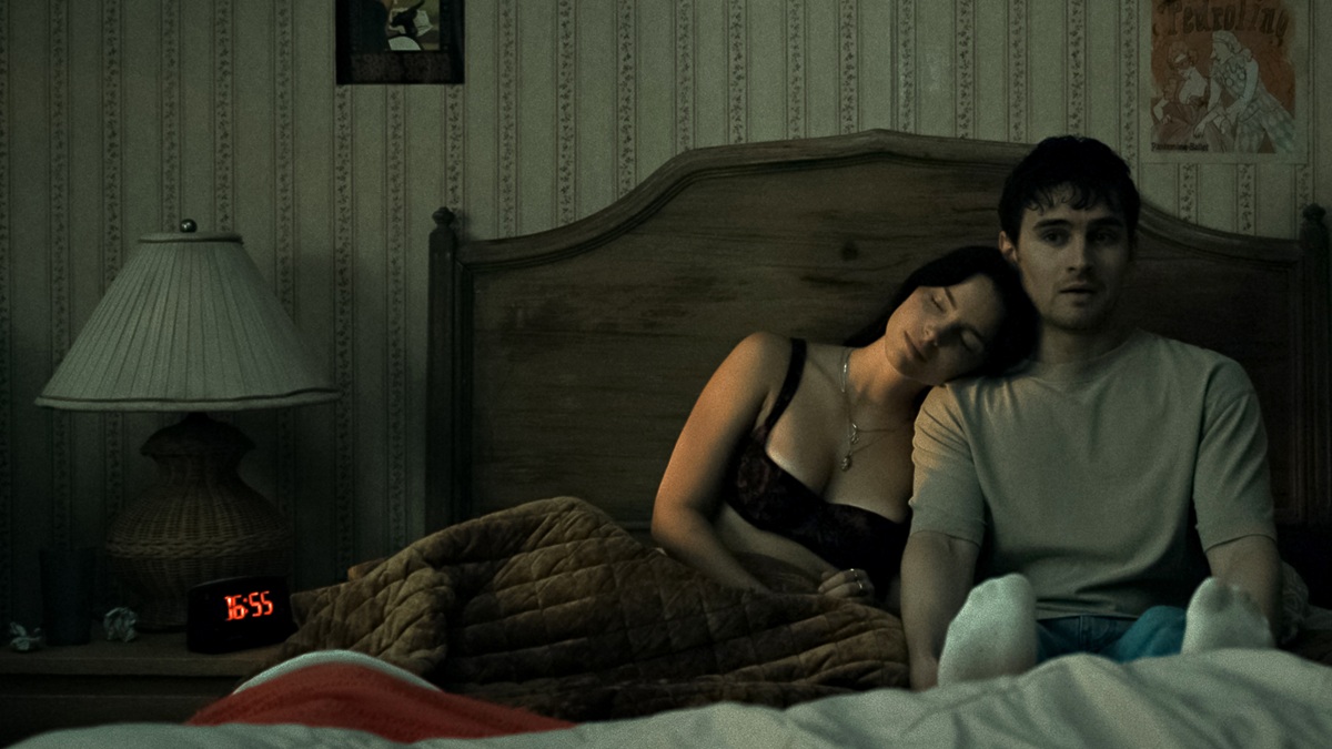 Nikki (Inde Navarrette) and Bear (Michael Johnston) in bed.