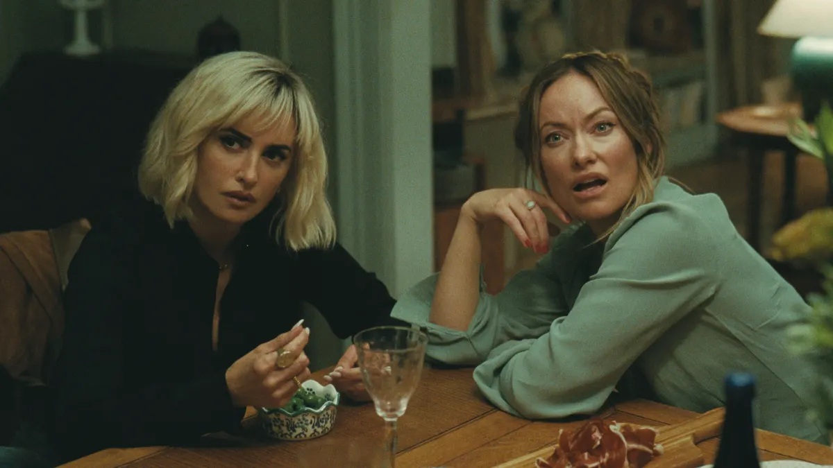 Penelope Cruz and Olivia Wilde in a scene from ‘The Invite’.